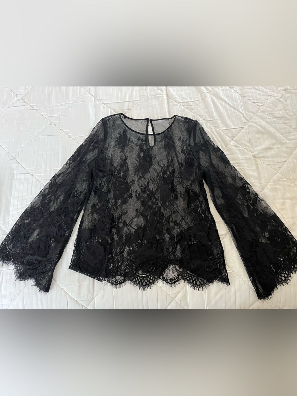 Sheer lace top with bell sleeves